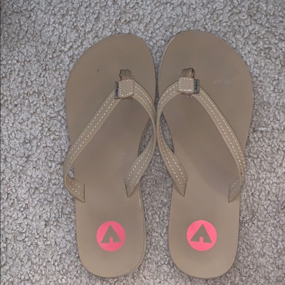 tan flip flops
